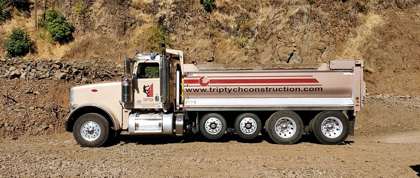 A photo of a Triptych Construction company truck